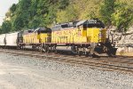 Manifest eases east approaching the yard